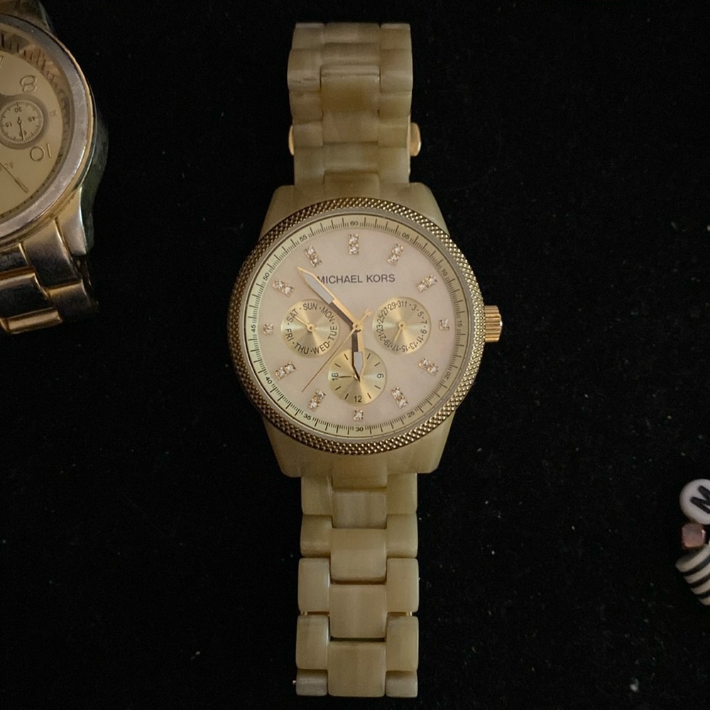 Bone colored Michael Kors watch.